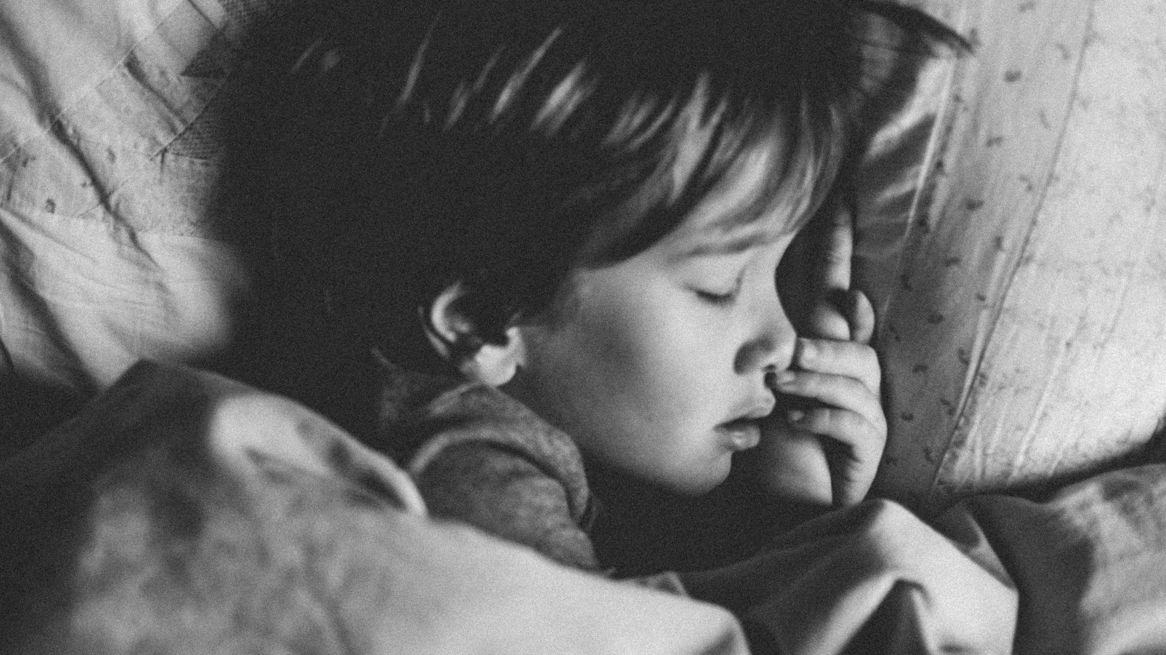 Child unable to sleep alone at night, close up